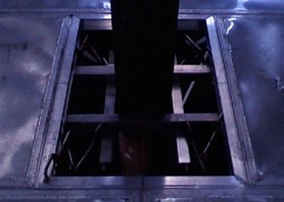 Well frame detail in a full-contact internal floating roof